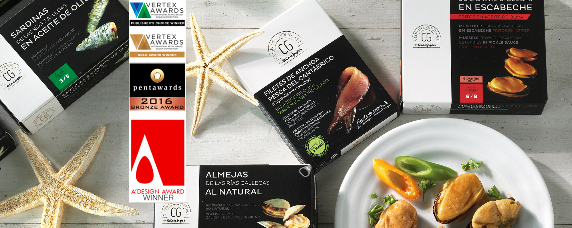 Club del Gourmet: Bodegón elegante con cajas de productos de mar gourmet, diseño de Tridimage. premio Vertex Publisher's y Gold Winner, Pentawards 2016 Bronze Award, A'Design Winner